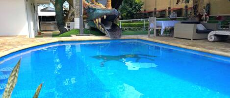 Outdoor pool, pool umbrellas, pool loungers