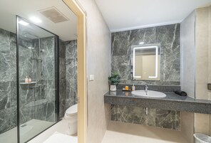 Family Suite, 2 Bedrooms | Bathroom | Hair dryer, slippers, towels, soap