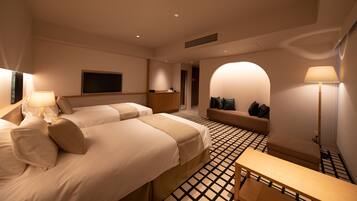 Quarto duplo luxo, para não fumantes (Up to 3 pax for above 6 yrs) | Edredons de pluma, berços (sobretaxa), Wi-Fi de cortesia, roupa de cama