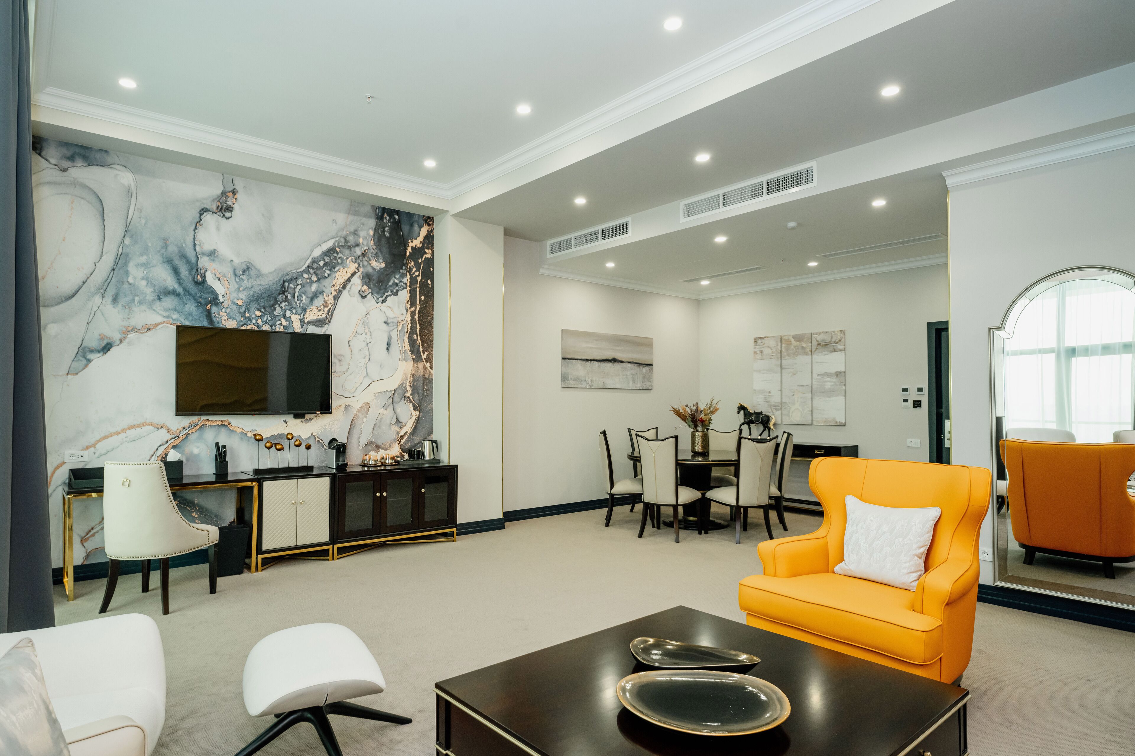 Executive Suite | Living area | 42-inch LCD TV with digital channels, TV, heated floors