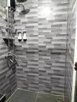 Classic Studio | Bathroom | Shower, rainfall showerhead, slippers, towels