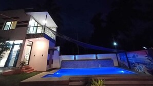 A two-story house with a swimming pool in the backyard. - Your Private Resort with Pool - A's Place! (Valencia)
