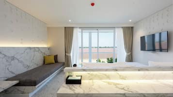 Deluxe Double Room, River View | Minibar, in-room safe, laptop workspace, free WiFi