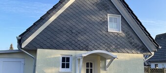 Vacation home in a quiet location close to the beach with a small garden