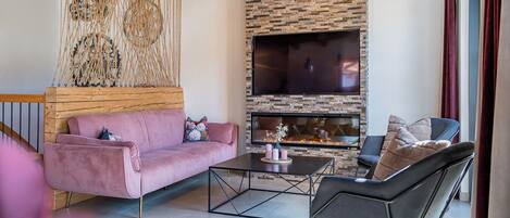 Smart TV, fireplace, books