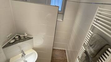 Shower, towels, soap, shampoo