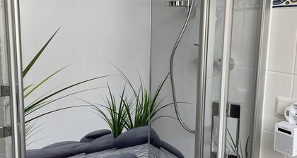 Vacation home in a quiet location close to the beach with a small garden