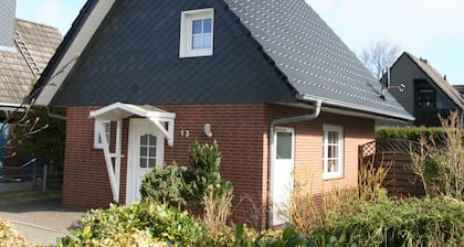 Vacation home in a quiet location close to the beach with a small garden