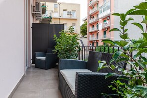 Apartamento executivo, 1 quarto | Terraço/pátio