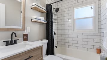 Hair dryer, towels, soap, shampoo