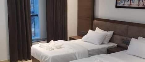 Chambre Deluxe | Coffre-fort, espace de travail pour ordinateurs portables