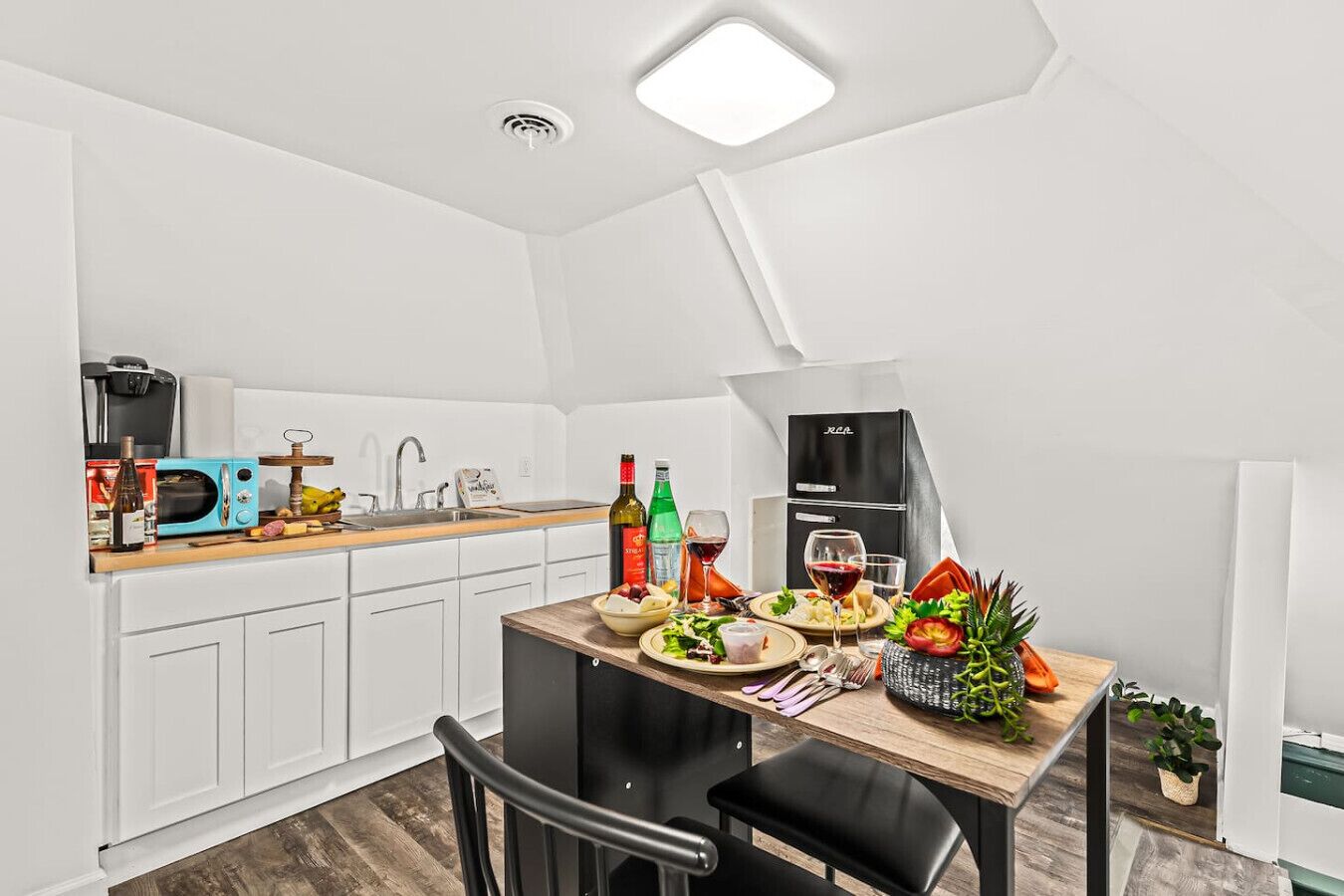 Fridge, microwave, stovetop, coffee/tea maker