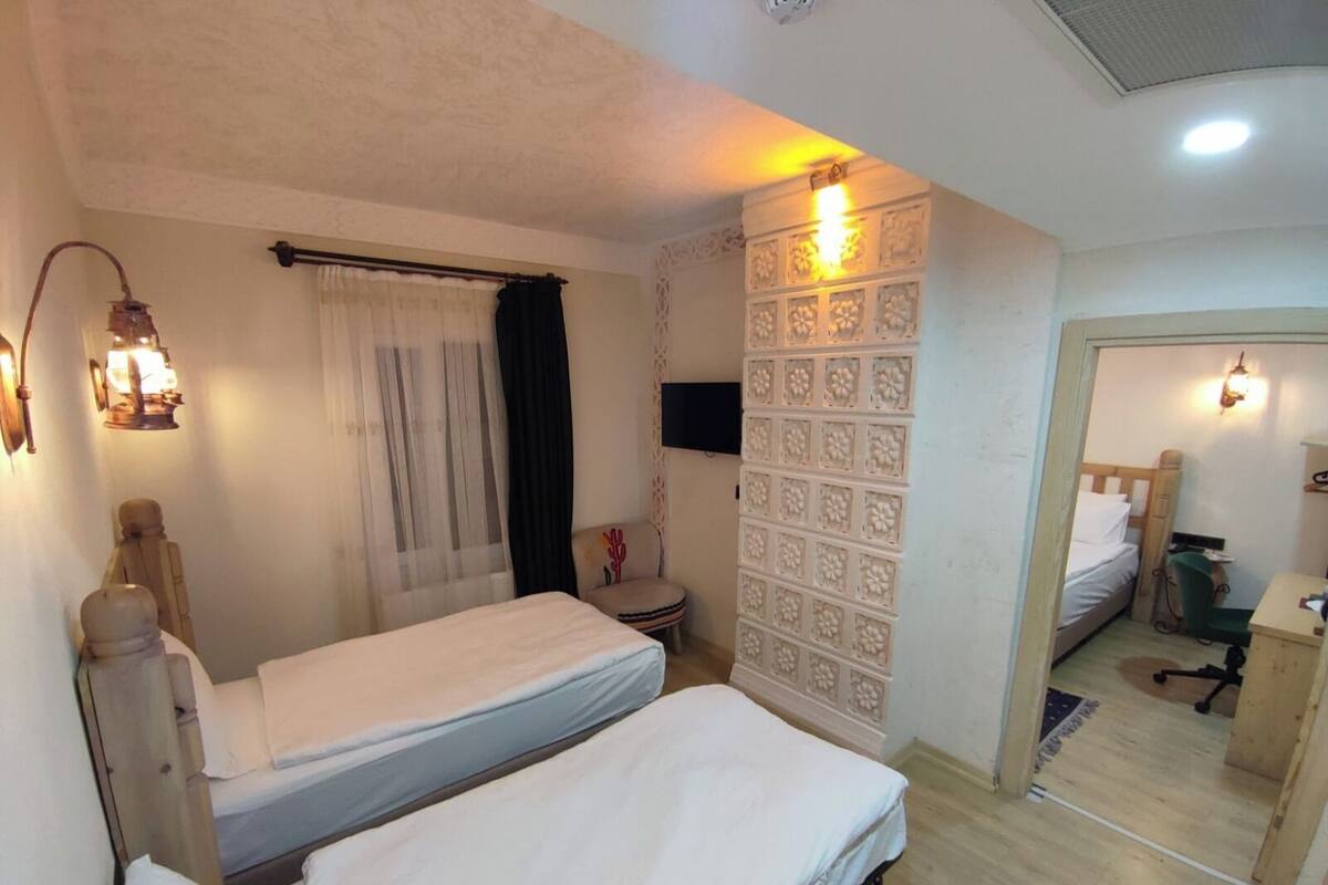 Family Room | Premium bedding, minibar (some free items), in-room safe, desk