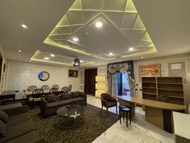 Presidential Suite, 1 King Bed, Balcony, Mountain View | Living area | 43-inch Smart TV with cable channels, TV, pay movies