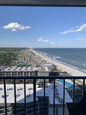 A high-rise hotel with a view of a beach and ocean. - Sea Shells- Ocean/Beach Views for miles. (Myrtle Beach)