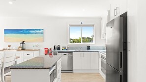Fridge, dishwasher - Unit 8, Boardwalk Apartments (Narooma)