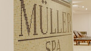 A tiled wall with the text "MULLER SPA" in a stylized font. - Muller Hotel Boutique&Spa (Galati)