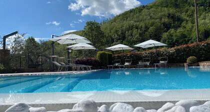 POETRY - cottage with garden, shared pool, private patio