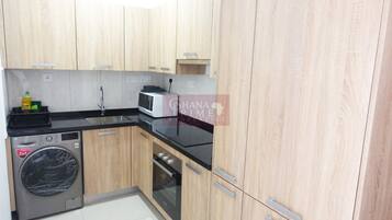 Luxury Apartment | Private kitchen | Full-size fridge, microwave, oven, dishwasher
