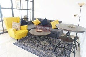 Luxury Apartment | Living area | 42-inch Smart TV with cable channels, TV - The Ivy (Accra)