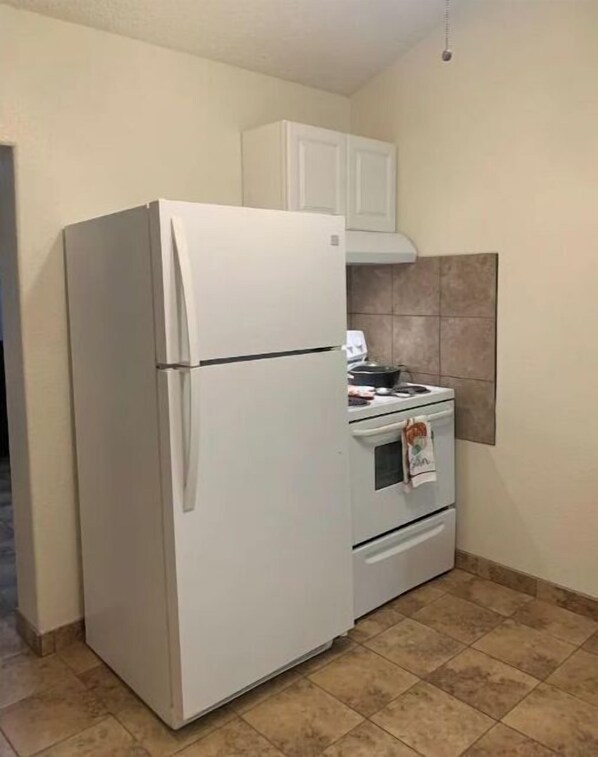 Full-size fridge, paper towels