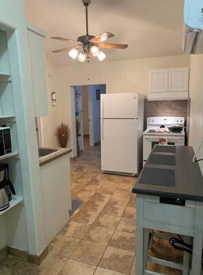 Full-size fridge, paper towels
