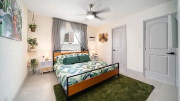 1 bedroom, desk, iron/ironing board, travel crib