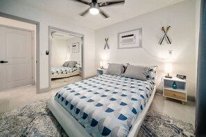 1 bedroom, desk, iron/ironing board, travel crib