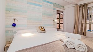 1 chambre, coffres-forts dans les chambres, fer et planche à repasser