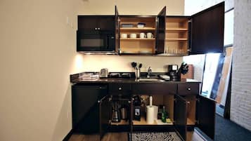 Fridge, microwave, coffee/tea maker, toaster