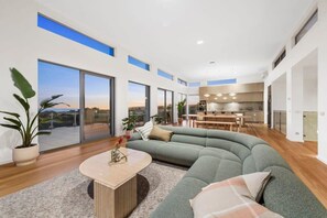 TV, fireplace, books, offices - Waterline Ocean Front Luxury  Bells Beach (Jan Juc)