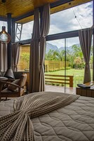 Romantic Chalet, 1 Queen Bed, Jetted Tub, Mountain View | Garden view