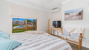 4 bedrooms, desk, iron/ironing board, travel cot