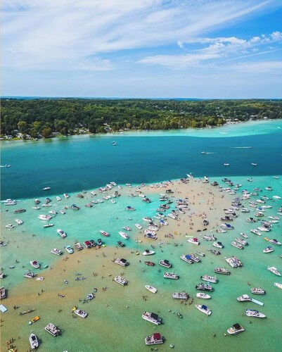 Family FUN: Torch Lake Cottage with Private Beach Access - Kayaks & SUP Provided