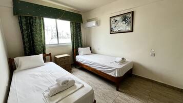 1 chambre, fer et planche à repasser, Wi-Fi gratuit, draps fournis