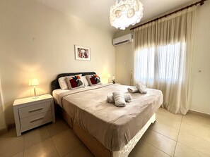 2 dormitorios, tabla de planchar con plancha, wifi gratis y ropa de cama