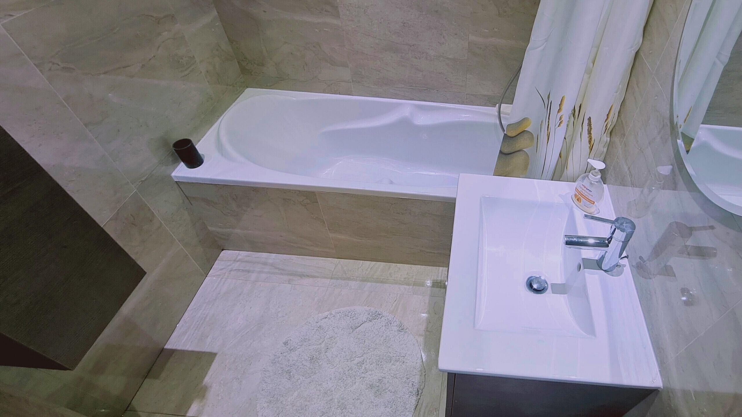 Bathtub, hair dryer, towels