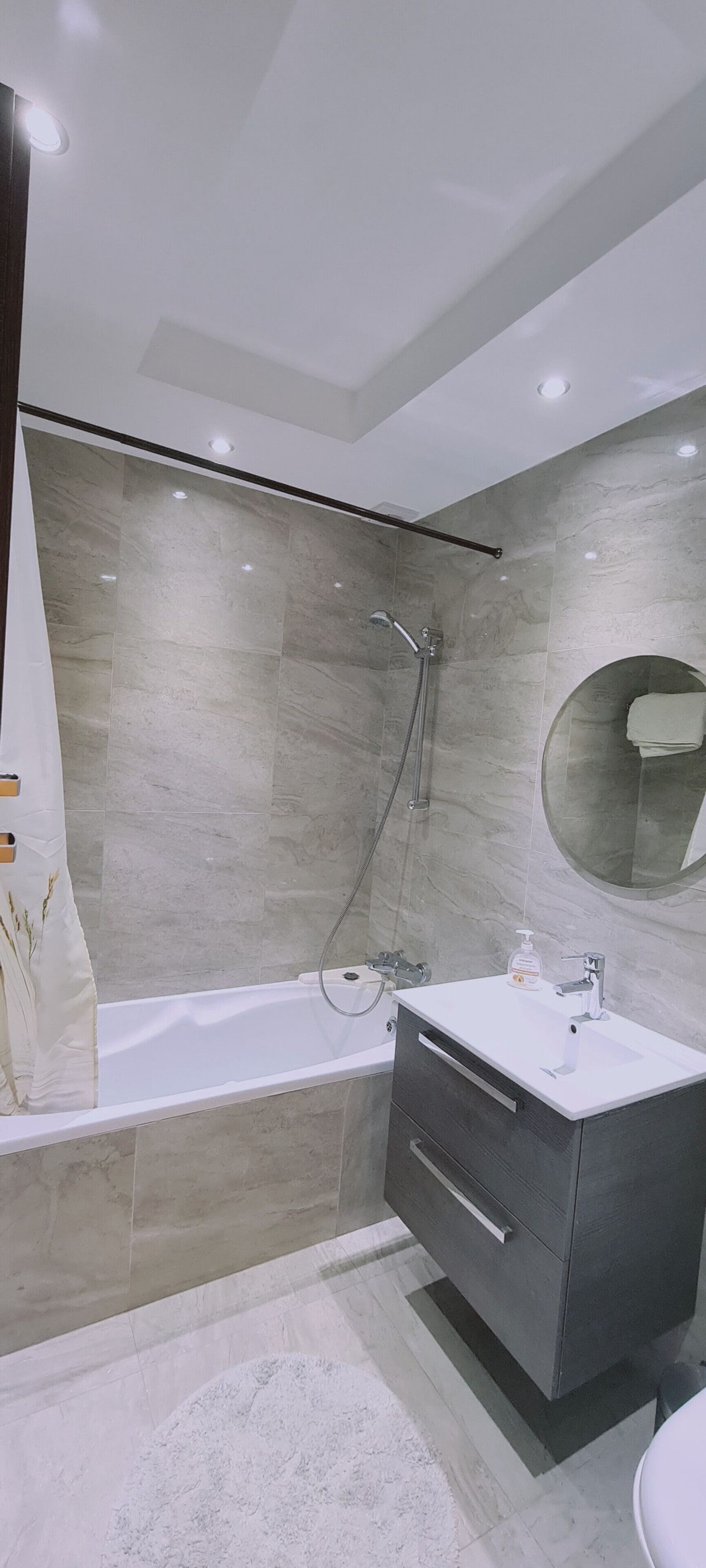 Bathtub, hair dryer, towels