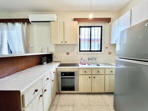 Fridge, oven, electric kettle, toaster