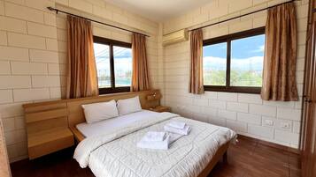 2 dormitorios, tabla de planchar con plancha, wifi gratis y ropa de cama