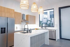 Fridge, oven, dishwasher, coffee/tea maker