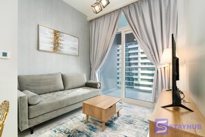 Signature Apartment, 1 Bedroom, Balcony, Lake View | Living area | LCD TV - Stunning 1BR Apt in Business Bay (Dubai)