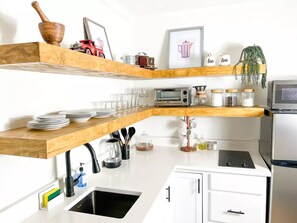 Fridge, microwave, stovetop, coffee/tea maker