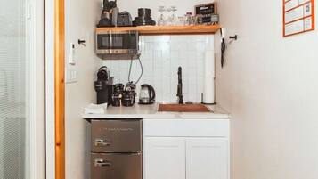 Fridge, microwave, stovetop, coffee/tea maker