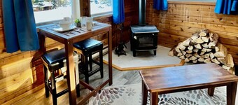 Romantic Cabin with Woodstove, Shared Hot Tub and Infrared Sauna.