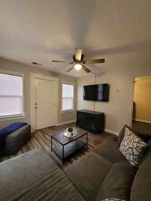 Living area - Cozy one bedroom close to downtown IA and IL with no cleaning fee! (Rock Island)