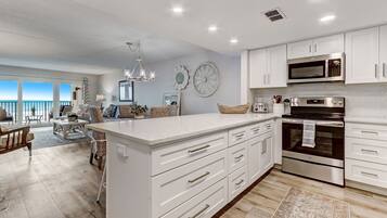 Coffee/tea maker, fridge, microwave, oven