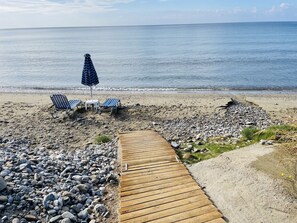 On the beach, sun loungers