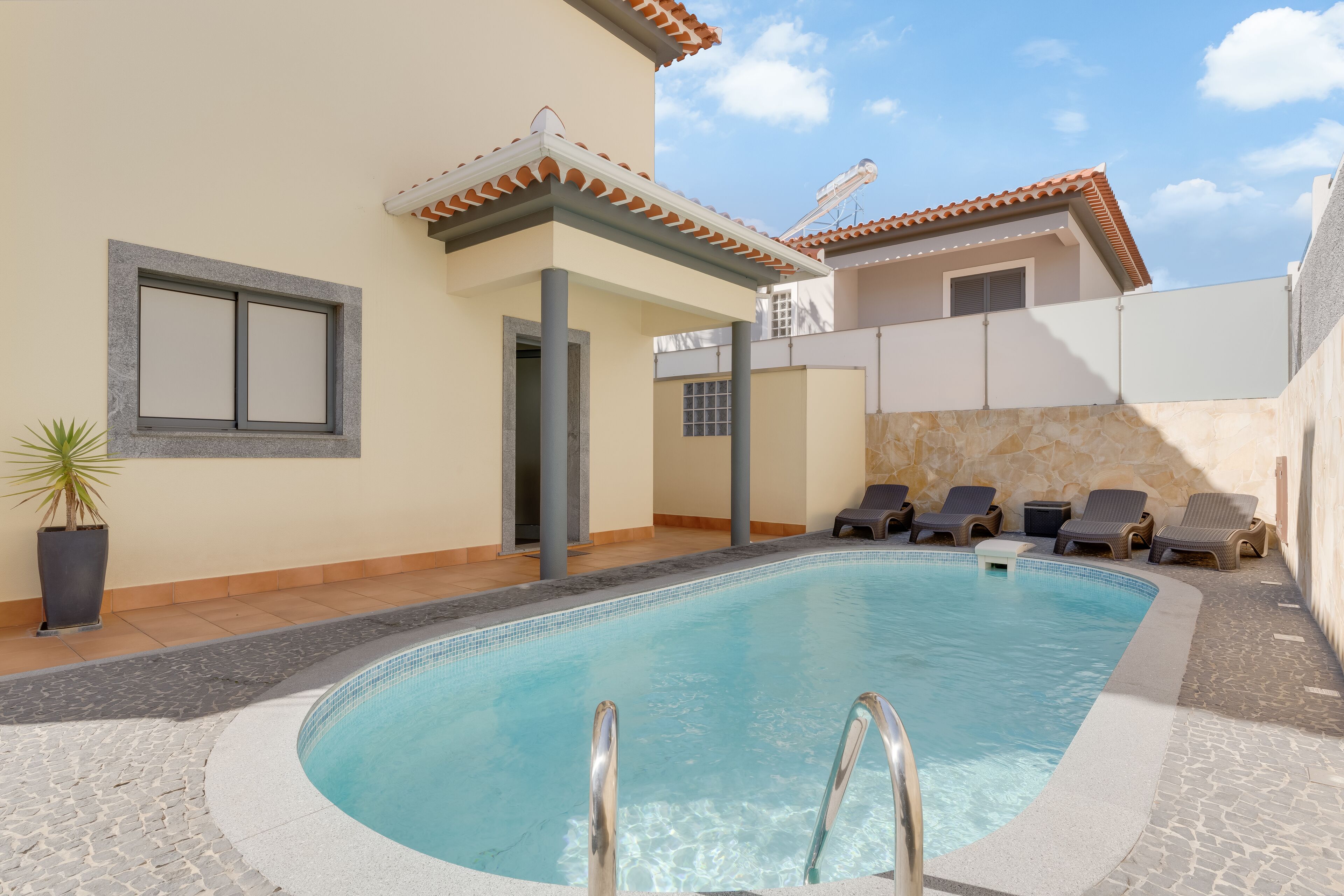 Outdoor pool, sun loungers