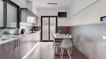 Luxury Villa | Private kitchen | Full-size fridge, microwave, oven, stovetop